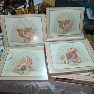 1 PIMPEREL MADE IN ENGLAND SET OF 4 HARD SEASHELL PLACEMATS